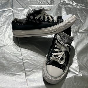 Black and white Converse shoes 7